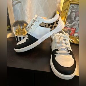 Cole Haan leopard print, black, and white sneakers